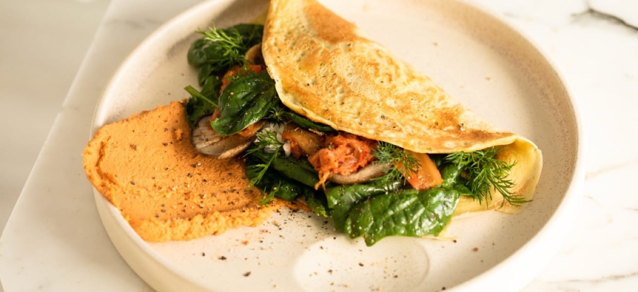 folded omelette with greens and cheese